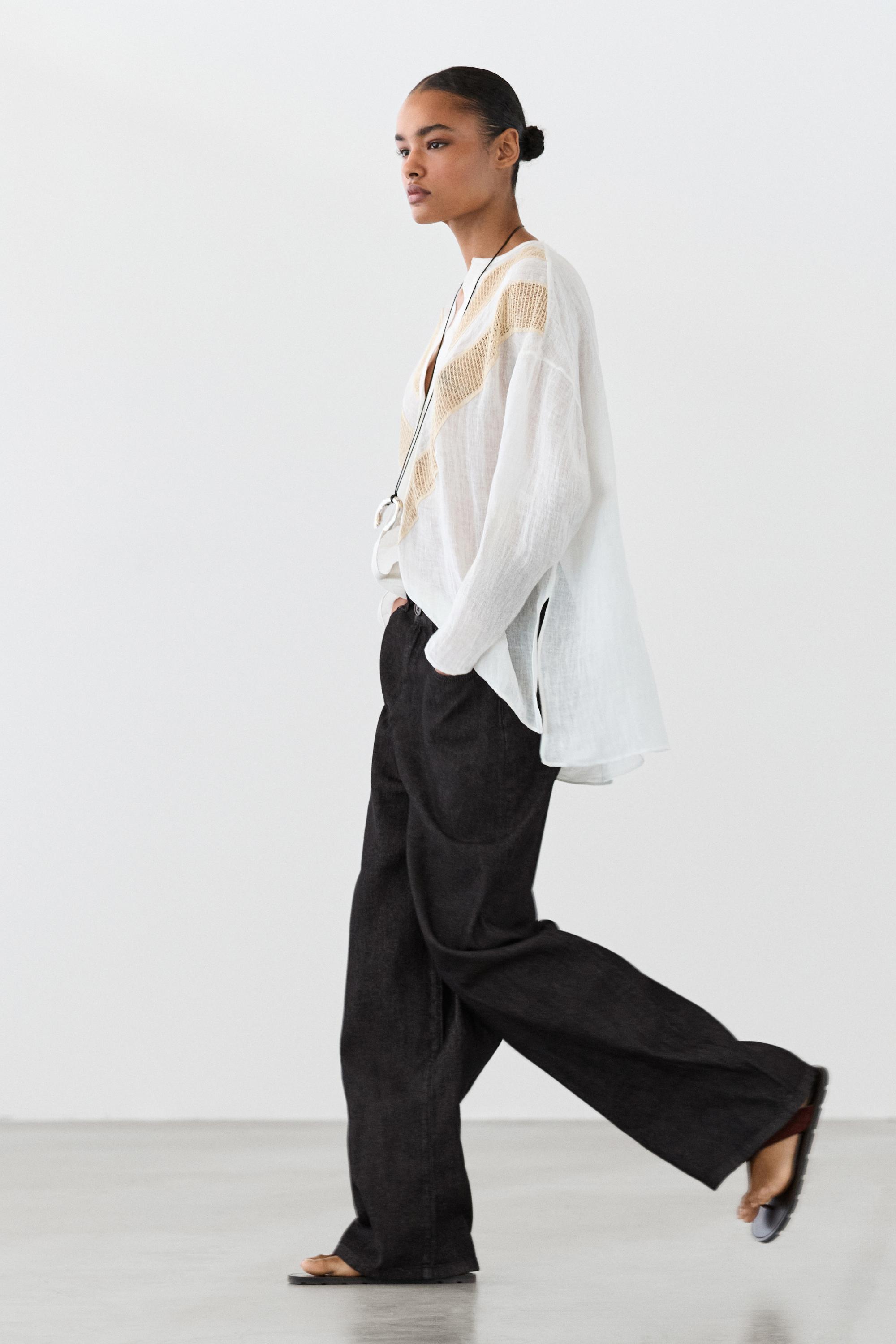 Flowing linen blend shirt with appliqué detail